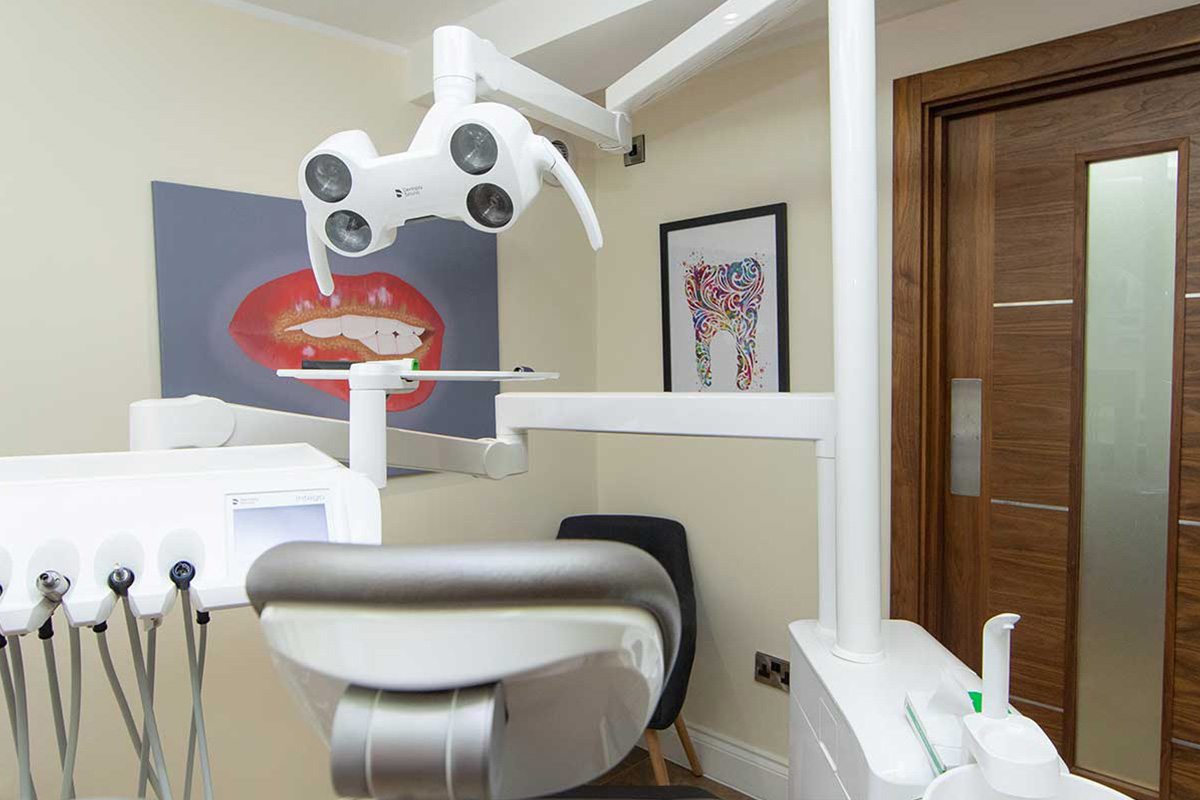 Happy patient looking in a mirror